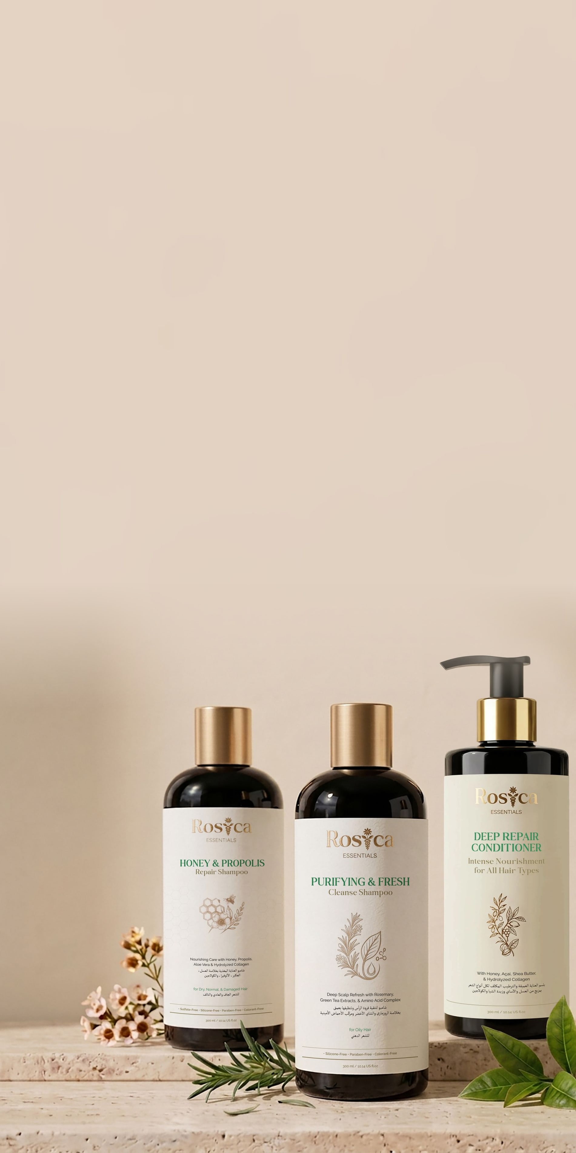 The three Rosica Essentials products on travertine with rosemary and blossom