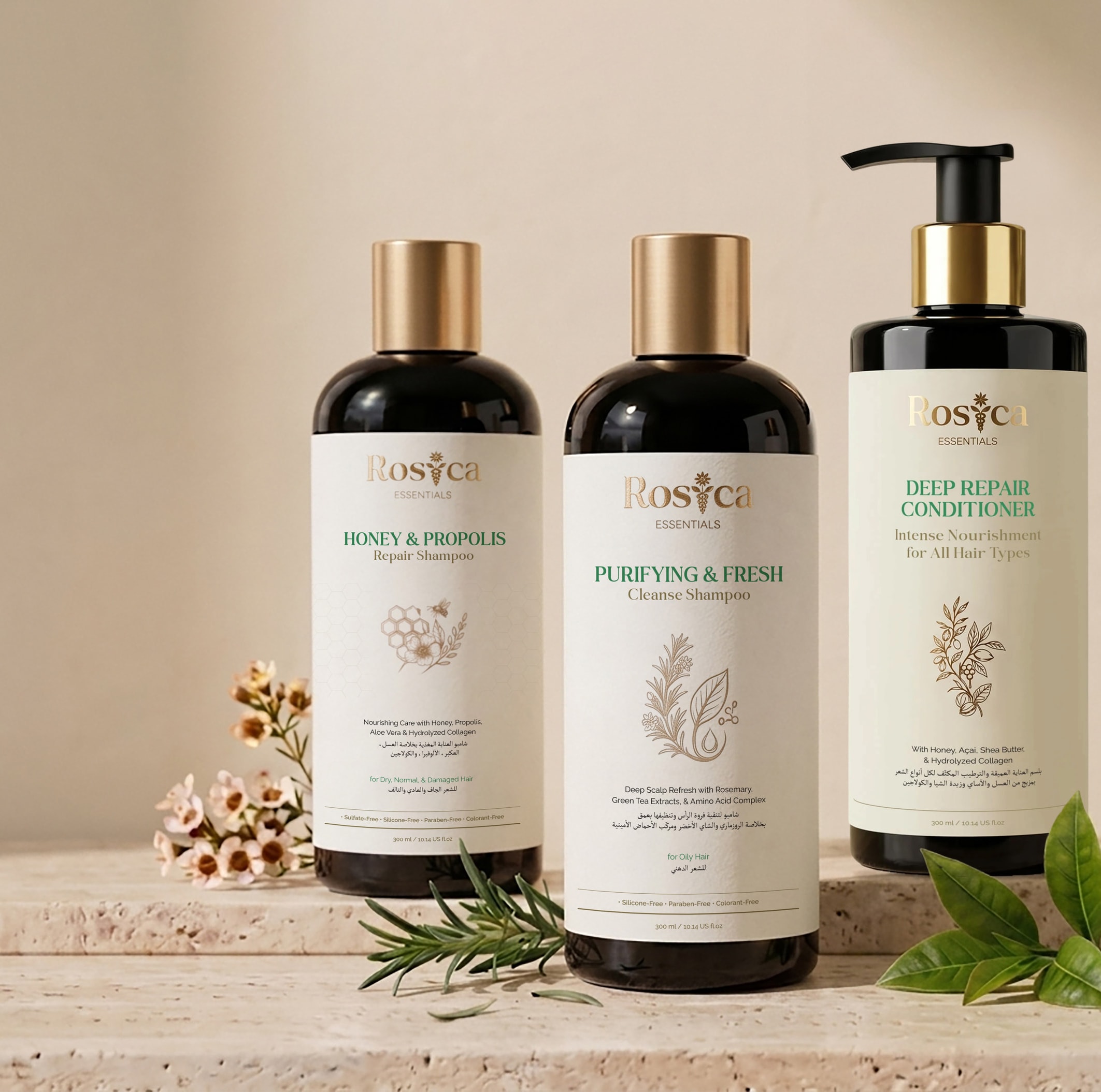 The three Rosica Essentials products on travertine with rosemary and blossom